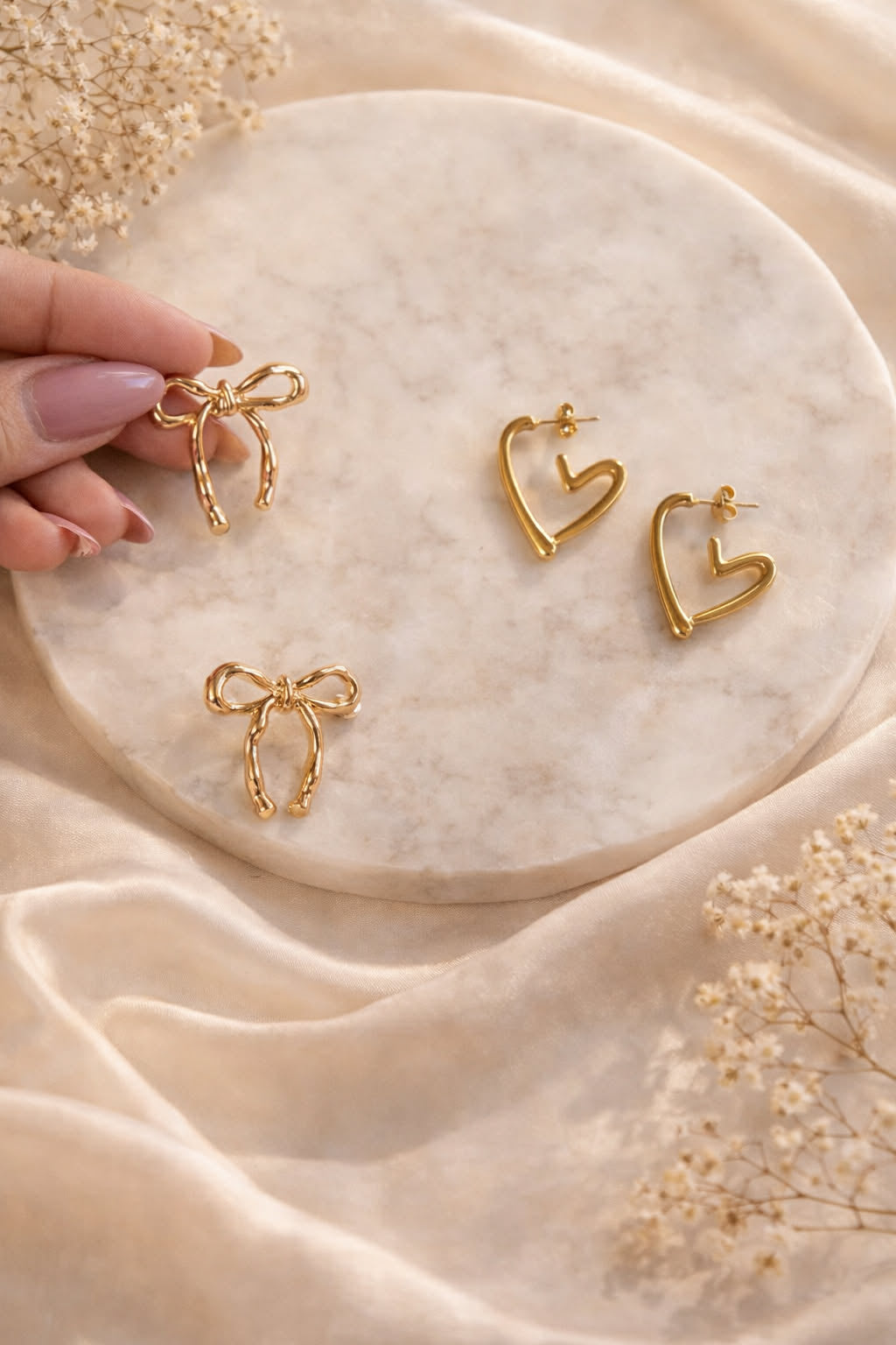 Boucle d'oreille NOEUD/ COEUR